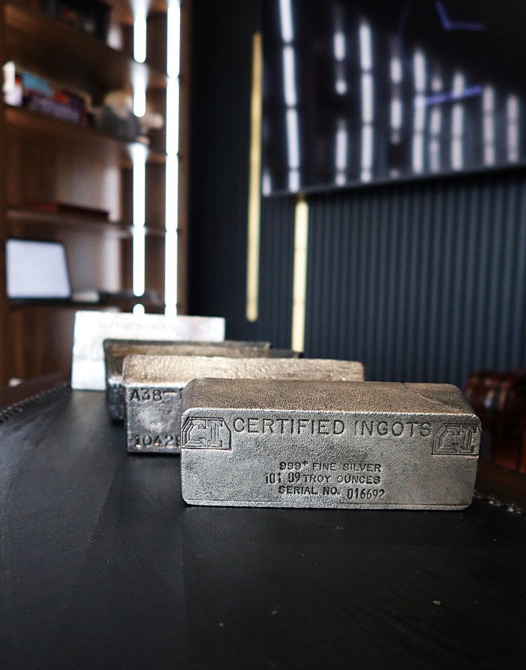 Hundred-ounce silver bars, weighed and paid the same day. Bring one or bring the whole shelf.